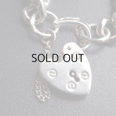 もう一つの輪っかに通します