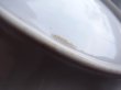 釉薬がかかっていない部分。カケではありません。